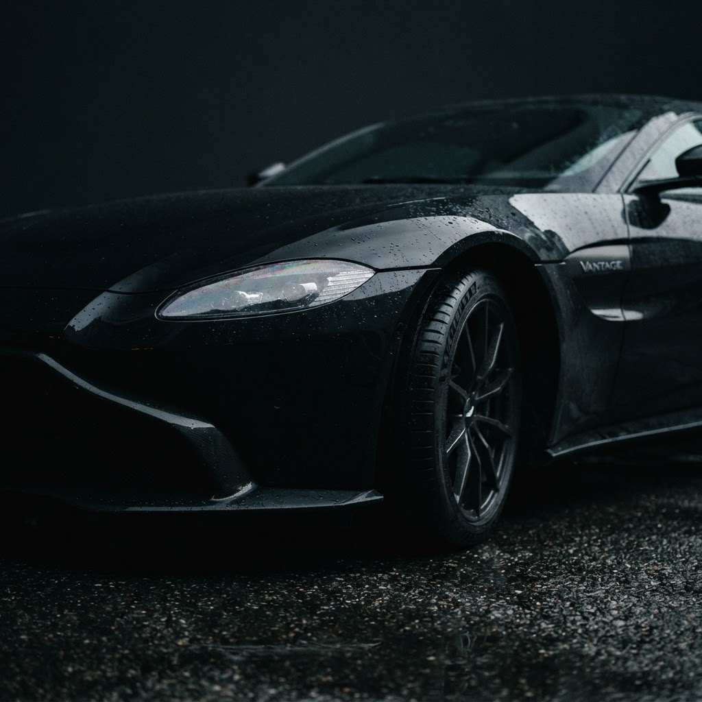 Close-up detail of a dark luxury sports car